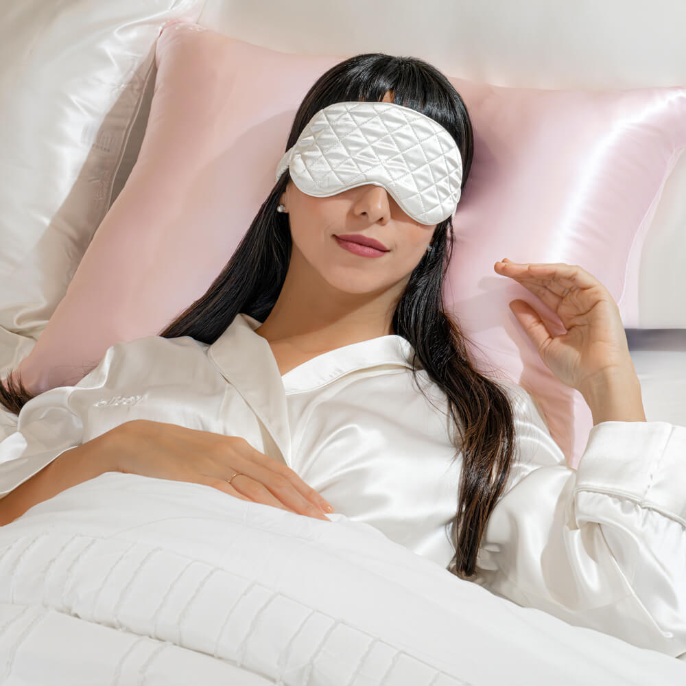 blissy_white_mulberry_silk_sleep_mask_diamond_quilted_lifestyle_1000px_4_1200x1200.jpg?v=1715475912